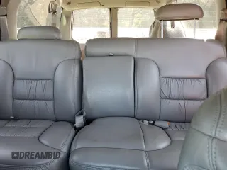 1999 GMC Suburban z VIN 3GKFK16R2XG544767, wystawiony jako Copart lot #67078414 z przebiegiem 154 145 mil mil oraz Szkoda całkowita • Salvage title. Historia ofert i sprzedaży dostępna na DreamBid. Obrazek 10.