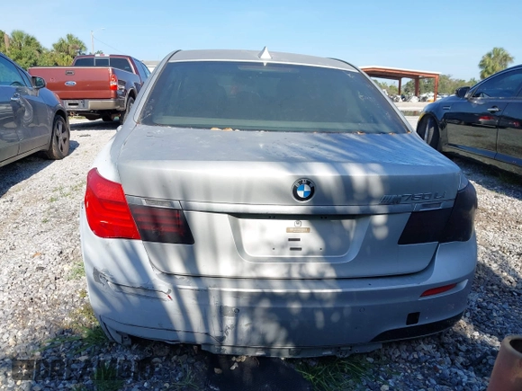 2013 BMW 7 Series 750Li with VIN WBAYE8C50DD133041, listed as a IAAI auction lot 42280002 with Not provided miles and . Bid and sale history available at DreamBid. Image 17.