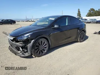 2023 Tesla Model Y Performance z VIN 7SAYGDEF9PF897644, wystawiony jako Copart lot #54788355 z przebiegiem 74 319 mil mil oraz Szkoda całkowita • Salvage title. Historia ofert i sprzedaży dostępna na DreamBid. Obrazek 1.