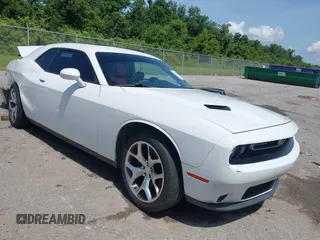2015 Dodge Challenger SXT Plus with VIN 2C3CDZBG4FH905009, listed as a IAAI auction lot 42396473 with 197,459 mi miles and . Bid and sale history available at DreamBid. Image 1.