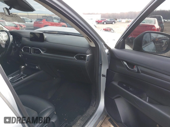 2020 Mazda CX-5 Touring with VIN JM3KFACM5L0768371, listed as a IAAI auction lot 41862623 with 138,446 mi miles and . Bid and sale history available at carsss.com. Image 5.