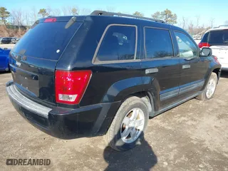 2006 Jeep Grand Cherokee Laredo with VIN 1J4GR48K16C142277, listed as a IAAI auction lot 41598878 with 169,236 mi miles. Bid and sale history available at carsss.com. Image 4.