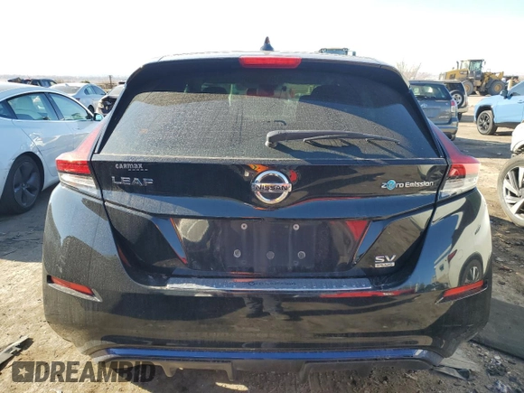 2019 Nissan LEAF SL Plus z VIN 1N4BZ1CPXKC308944, wystawiony jako Copart lot #83370044 z przebiegiem 64 151 mil mil oraz Szkoda całkowita • Salvage title. Historia ofert i sprzedaży dostępna na DreamBid. Obrazek 6.