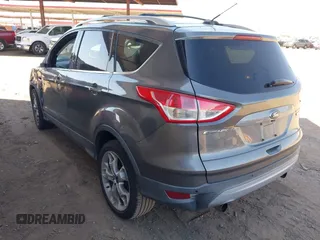 2013 Ford Escape Titanium with VIN 1FMCU0J95DUA29390, listed as a IAAI auction lot 42720269 with 147,413 mi miles and . Bid and sale history available at DreamBid. Image 3.