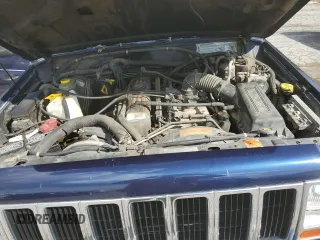 1997 Jeep Cherokee with VIN 1J4FN78S6VL604971, listed as a Copart auction lot 70690304 with 226,913 mi miles and Salvage title. Bid and sale history available at DreamBid. Image 12.