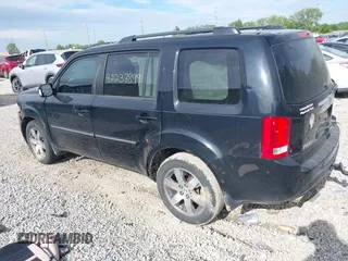 2013 Honda Pilot Touring with VIN 5FNYF3H93DB031630, listed as a IAAI auction lot 42237899 with 198,523 mi miles and . Bid and sale history available at DreamBid. Image 3.