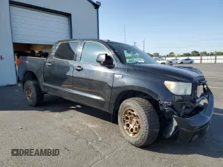 2012 Toyota Tundra with VIN 5TFDY5F14CX214234, listed as a Copart auction lot 60472275 with 205,225 mi miles and Salvage title. Bid and sale history available at DreamBid. Image 4.