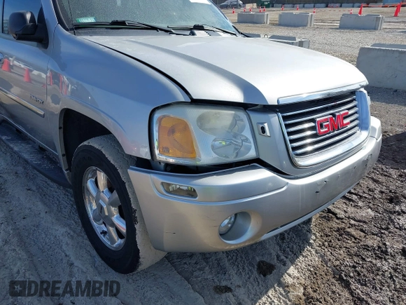 2006 GMC Envoy SLE with VIN 1GKDT13S362185383, listed as a IAAI auction lot 41542679 with 1 mi miles. Bid and sale history available at carsss.com. Image 13.