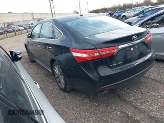 2014 Toyota Avalon Limited with VIN 4T1BK1EB4EU096164, listed as a IAAI auction lot 40904808 with 242,086 mi miles. Bid and sale history available at carsss.com. Image 3.