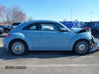 2014 Volkswagen Beetle 2.5L w/Sun with VIN 3VWJP7AT6EM601318, listed as a IAAI auction lot 41902598 with 169,220 mi miles and . Bid and sale history available at DreamBid. Image 13.