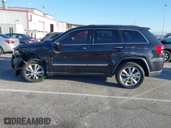 2013 Jeep Grand Cherokee Laredo with VIN 1C4RJEAG2DC643290, listed as a IAAI auction lot 41751696 with 125,258 mi miles. Bid and sale history available at carsss.com. Image 14.