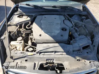 2006 Infiniti G35 z VIN JNKCV51FX6M617002, wystawiony jako Copart lot #51064345 z przebiegiem Nie podano mil oraz Szkody całkowita. Historia ofert i sprzedaży dostępna na DreamBid. Obrazek 11.