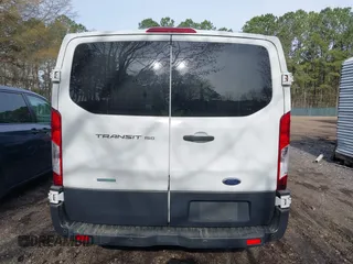 2015 Ford Transit Cargo with VIN 1FTNE1YG3FKA37376, listed as a IAAI auction lot 41934749 with 294,351 mi miles. Bid and sale history available at carsss.com. Image 16.