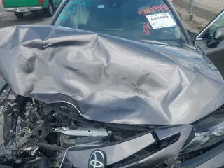 2022 Toyota Camry SE z VIN 4T1G11AK0NU057778, wystawiony jako IAAI lot #42094950 z przebiegiem 115 649 mil mil oraz . Historia ofert i sprzedaży dostępna na DreamBid. Obrazek 10.