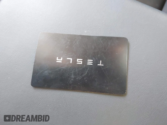 2023 Tesla Model Y Long Range z VIN 7SAYGDEE0PA128888, wystawiony jako IAAI lot #41410085 z przebiegiem 12 578 mil mil oraz . Historia ofert i sprzedaży dostępna na DreamBid. Obrazek 11.