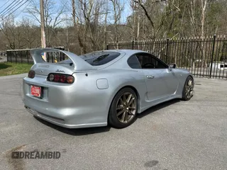 1993 Toyota Supra с VIN JZA800010229, выставлен на аукционе Copart как лот 50000065 с пробегом 130 612 миль миль и Чистый • Clean title. История ставок и продаж доступна на DreamBid. Изображение 4.