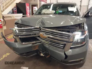 2016 Chevrolet Tahoe LTZ with VIN 1GNSKCKC3GR346276, listed as a IAAI auction lot 41646214 with 102,625 mi miles and . Bid and sale history available at DreamBid. Image 6.