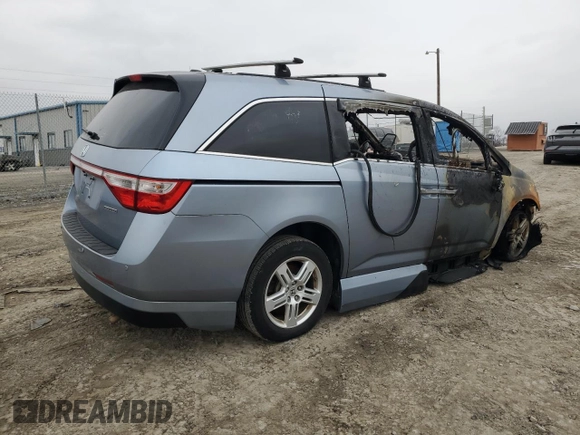 2012 Honda Odyssey Touring with VIN 5FNRL5H92CB127191, listed as a Copart auction lot 44720295 with Not Provided miles and Salvage Title. Bid and sale history available at DreamBid. Image 3.