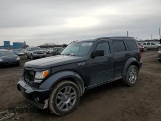 2011 Dodge Nitro Heat with VIN 1D4PU4GX0BW501101, listed as a Copart auction lot 84896064 with 146,945 mi miles and Salvage Title. Bid and sale history available at carsss.com. Image 1.