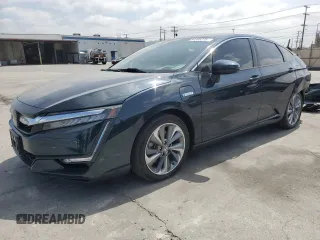 2018 Honda Clarity Touring z VIN JHMZC5F32JC002988, wystawiony jako Copart lot #54586275 z przebiegiem 104 909 mil mil oraz Szkoda całkowita • Salvage title. Historia ofert i sprzedaży dostępna na DreamBid. Obrazek 1.