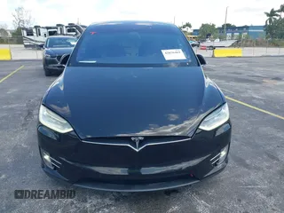 2017 Tesla Model X 90D with VIN 5YJXCBE21HF054898, listed as a IAAI auction lot 42076462 with 89,996 mi miles and . Bid and sale history available at DreamBid. Image 11.