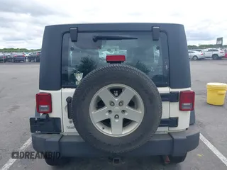 2008 Jeep Wrangler Unlimited X z VIN 1J4GA39188L584256, wystawiony jako IAAI lot #42349536 z przebiegiem 126 778 mil mil oraz . Historia ofert i sprzedaży dostępna na DreamBid. Obrazek 16.