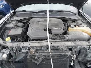 2015 Dodge Charger SE with VIN 2C3CDXBG7FH841469, listed as a IAAI auction lot 42001599 with 103,342 mi miles and . Bid and sale history available at DreamBid. Image 10.