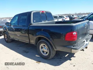 2003 Ford F-150 XLT with VIN 1FTRW07L83KC62296, listed as a IAAI auction lot 41689891 with 272,210 mi miles. Bid and sale history available at carsss.com. Image 3.