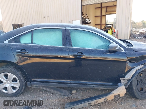 2014 Ford Police Interceptor z VIN 1FAHP2MK3EG124483, wystawiony jako IAAI lot #41018811 z przebiegiem 200 626 mil mil oraz . Historia ofert i sprzedaży dostępna na DreamBid. Obrazek 13.