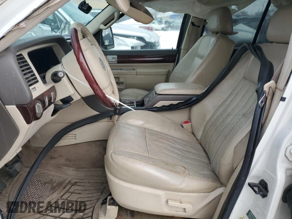 2004 Lincoln Aviator Luxury with VIN 5LMEU88H04ZJ25027, listed as a Copart auction lot 87581655 with 217,485 mi miles and Salvage Title. Bid and sale history available at DreamBid. Image 7.