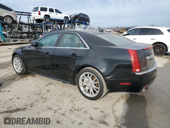 2012 Cadillac CTS Premium with VIN 1G6DS5E35C0142296, listed as a Copart auction lot 45970185 with 128,586 mi miles and Salvage Title. Bid and sale history available at DreamBid. Image 2.