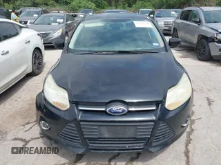 2012 Ford Focus SE with VIN 1FAHP3F28CL361932, listed as a IAAI auction lot 42142318 with 135,179 mi miles and . Bid and sale history available at carsss.com. Image 6.