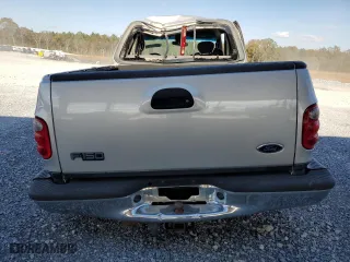 2003 Ford F-150 XL with VIN 1FTRX07W03KB17955, listed as a Copart auction lot 83061424 with 164,529 mi miles and Salvage Title. Bid and sale history available at carsss.com. Image 6.