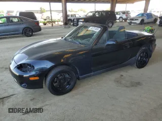 2003 Mazda MX-5 Miata Cloth with VIN JM1NB353130309940, listed as a Copart auction lot 46751055 with 115,399 mi miles and Clean Title. Bid and sale history available at DreamBid. Image 1.