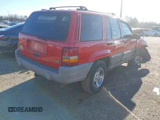 1997 Jeep Grand Cherokee TSi with VIN 1J4FX58S9VC528094, listed as a IAAI auction lot 41299294 with Not Provided miles. Bid and sale history available at carsss.com. Image 4.