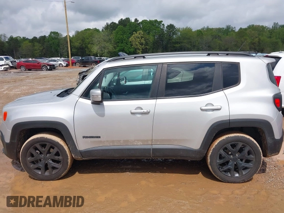 2017 Jeep Renegade Latitude z VIN ZACCJBBB2HPF61293, wystawiony jako IAAI lot #42004209 z przebiegiem 101 214 mil mil oraz . Historia ofert i sprzedaży dostępna na DreamBid. Obrazek 14.