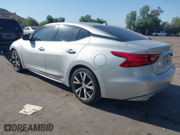 2017 Nissan Maxima Platinum with VIN 1N4AA6AP2HC414204, listed as a IAAI auction lot 42394624 with 80,486 mi miles and . Bid and sale history available at DreamBid. Image 3.