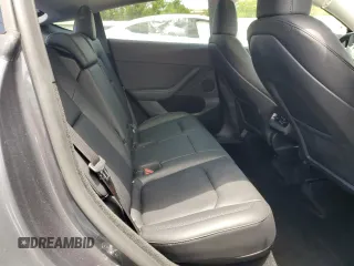 2023 Tesla Model Y Long Range with VIN 7SAYGDEE9PF885405, listed as a Copart auction lot 52858105 with 23,424 mi miles and Non Repairable. Bid and sale history available at DreamBid. Image 10.