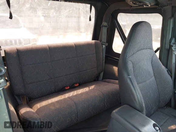 2002 Jeep Wrangler Sport with VIN 1J4FA49S32P700831, listed as a IAAI auction lot 42626269 with 182,870 mi miles and . Bid and sale history available at DreamBid. Image 8.