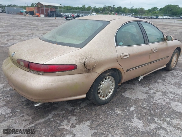 1996 Mercury Sable LS with VIN 1MELM53S6TA606332, listed as a IAAI auction lot 41984196 with 150,924 mi miles. Bid and sale history available at carsss.com. Image 4.