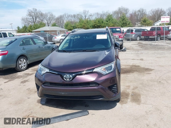 2016 Toyota RAV4 LE with VIN 2T3ZFREV8GW310580, listed as a IAAI auction lot 42063071 with 104,099 mi miles and . Bid and sale history available at DreamBid. Image 13.