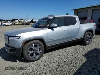 2023 Rivian R1T Adventure with VIN 7FCTGBAA0PN025046, listed as a Copart auction lot 62502274 with 1,385 mi miles and Salvage Title. Bid and sale history available at carsss.com. Image 1.