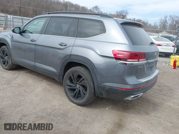 2021 Volkswagen Atlas SE with VIN 1V2KR2CA0MC570498, listed as a IAAI auction lot 41807676 with 56,434 mi miles and . Bid and sale history available at DreamBid. Image 3.