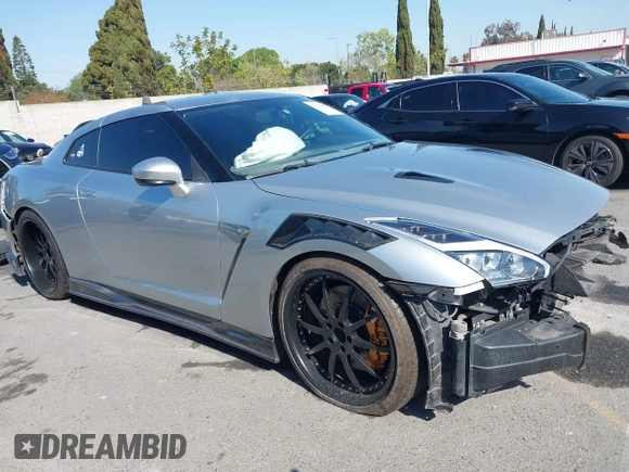 2009 Nissan GT-R Premium z VIN JN1AR54F79M250219, wystawiony jako IAAI lot #41964474 z przebiegiem 77 677 mil mil oraz . Historia ofert i sprzedaży dostępna na DreamBid. Obrazek 13.