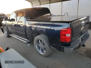 2012 Chevrolet Silverado 1500 with VIN 1GCPCSE7XCF165532, listed as a Copart auction lot 86780984 with 148,080 mi miles and Salvage Title. Bid and sale history available at DreamBid. Image 2.