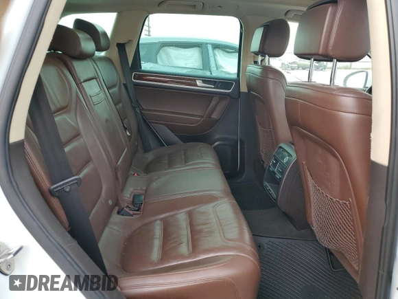 2013 Volkswagen Touareg Sport с VIN WVGEP9BP9DD003974, выставлен на аукционе Copart как лот 75106234 с пробегом 211 323 миль миль и Чистый • Clean title. История ставок и продаж доступна на DreamBid. Изображение 11.