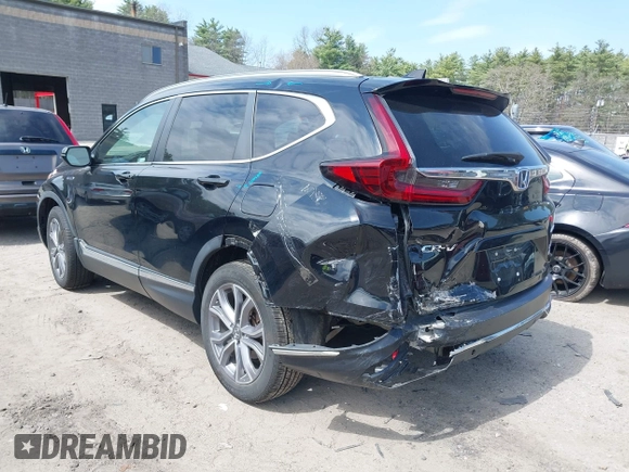 2020 Honda CR-V Touring with VIN 7FART6H96LE023782, listed as a IAAI auction lot 42053948 with 56,814 mi miles and . Bid and sale history available at DreamBid. Image 3.