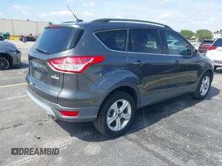 2016 Ford Escape SE with VIN 1FMCU0GXXGUB66870, listed as a IAAI auction lot 42219454 with 116,158 mi miles and . Bid and sale history available at carsss.com. Image 4.