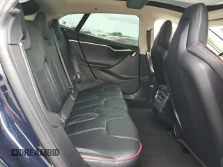 2013 Tesla Model S Performance с VIN 5YJSA1DP9DFP05325, выставлен на аукционе Copart как лот 52617545 с пробегом 122 847 миль миль и Списание • Salvage title. История ставок и продаж доступна на DreamBid. Изображение 10.