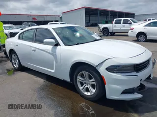 2020 Dodge Charger SXT with VIN 2C3CDXBG7LH100685, listed as a IAAI auction lot 41891270 with 129,277 mi miles. Bid and sale history available at carsss.com. Image 1.
